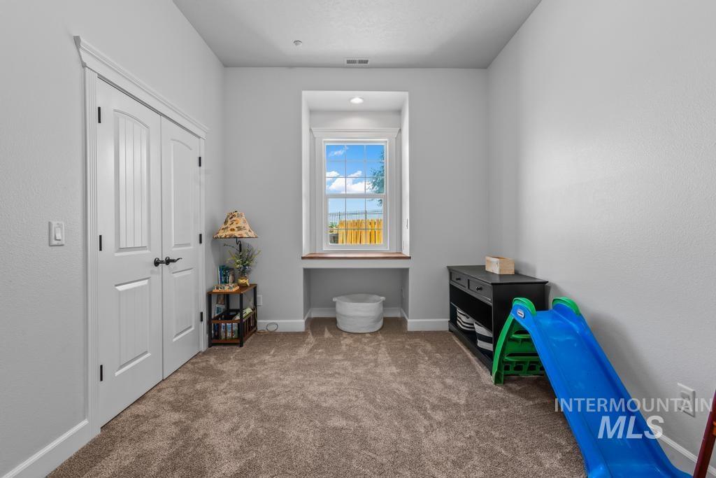 28279 Pearl Road Parma, ID 83660 - Photo 32 of 46 Interior space with dark carpet and a closet