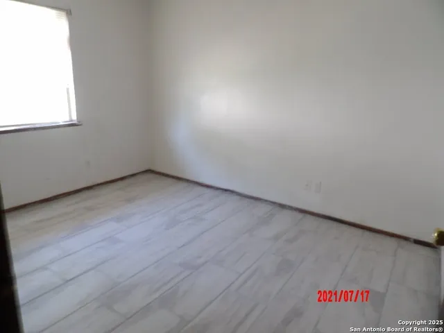 an empty room with a window