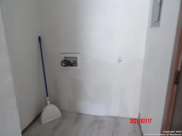 a view of storage and utility room