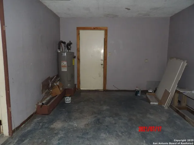 a view of backyard with green space