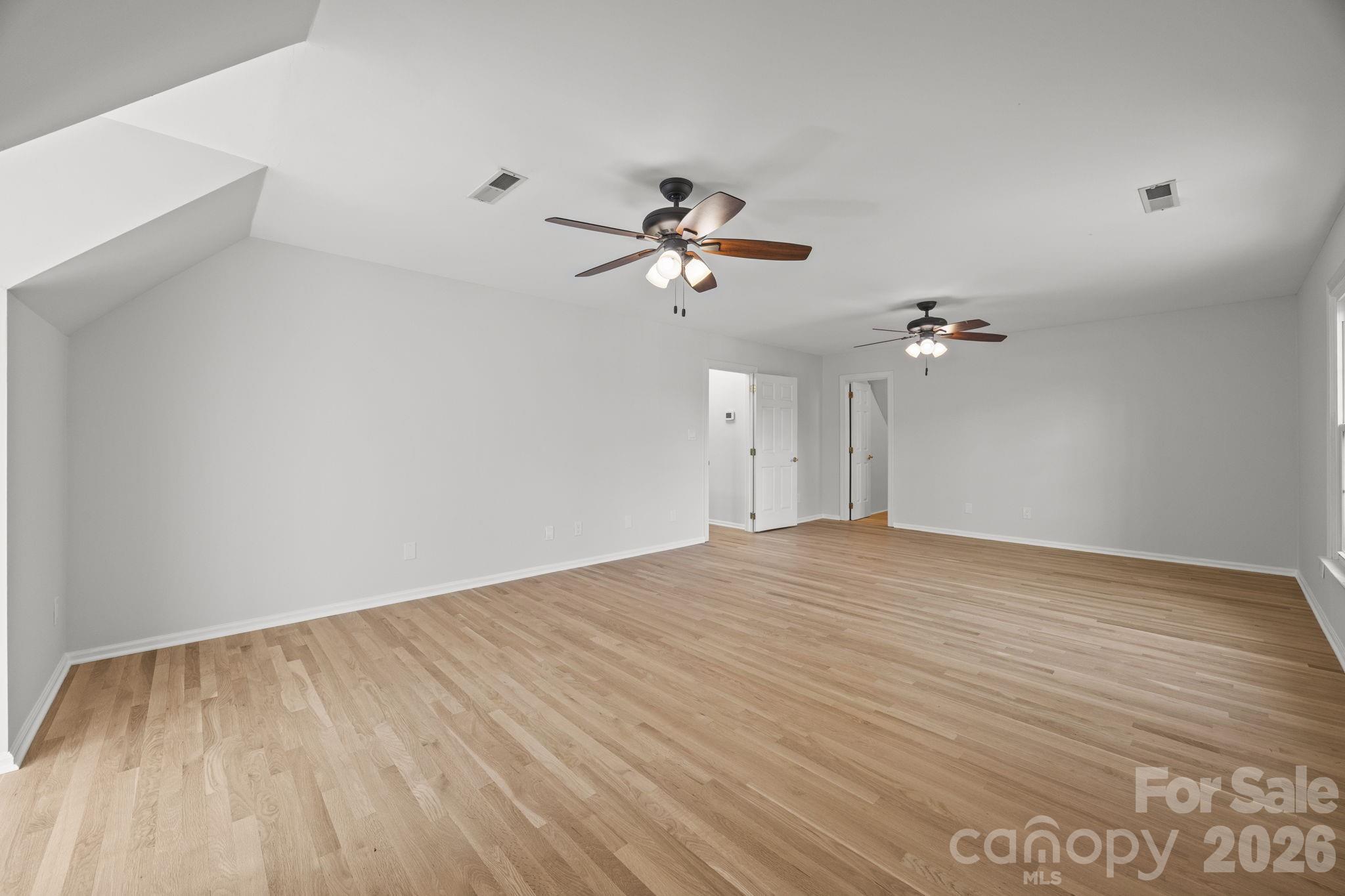 5243 Mintridge Road Mint Hill, NC 28227 - Photo 27 of 43 a view of a room with a ceiling fan and a ceiling fan