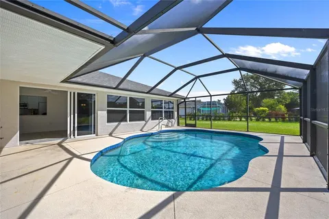 a view of a house with swimming pool