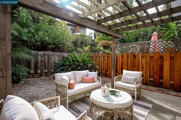 a outdoor living space with furniture and garden view