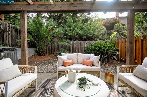 a outdoor living space with furniture and garden view
