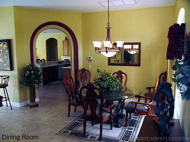 1909 Southwest Panther Trace Stuart, FL 34997 - Photo 4 of 25 Dining Room.