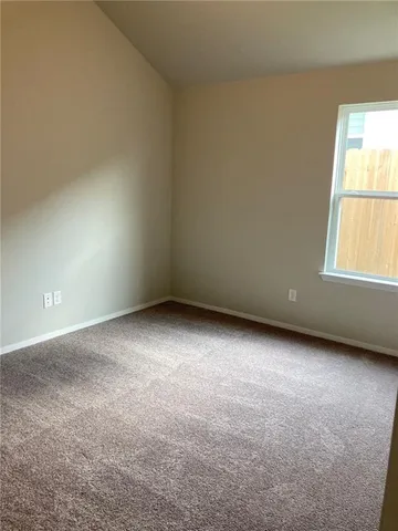 a bathroom with a sink vanity and mirror