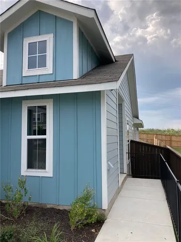 a view of house with outdoor space