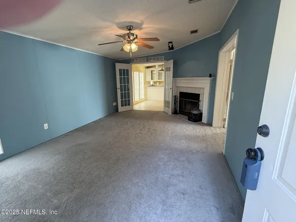 a view of a livingroom with a fireplace