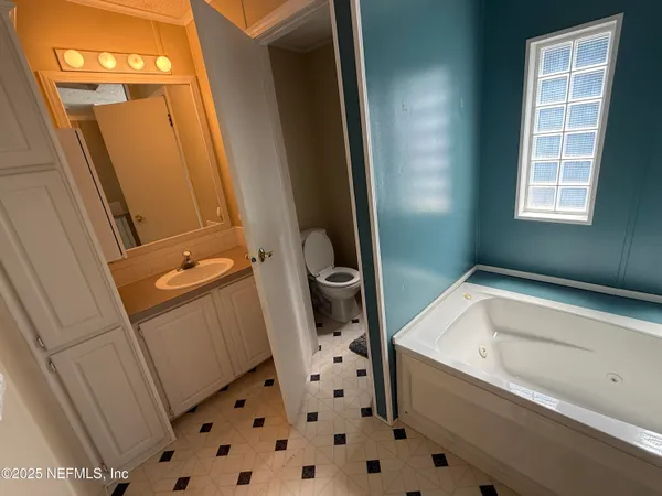 a bathroom with a sink and a toilet