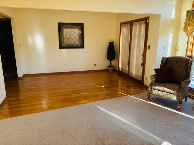 a bathroom with a shower and a glass door