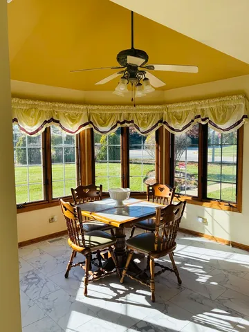 a view of a room with wooden walls
