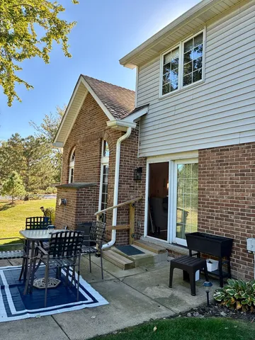 a view of a house with patio