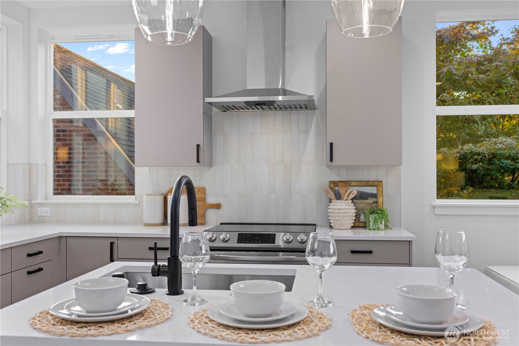 1704 North 47th Street Seattle, WA 98103 - Photo 14 of 38 a kitchen with a stove a sink and a window