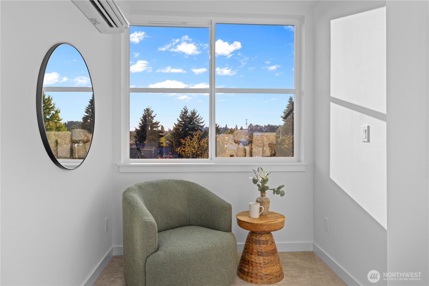1704 North 47th Street Seattle, WA 98103 - Photo 19 of 38 a living room with furniture and a window