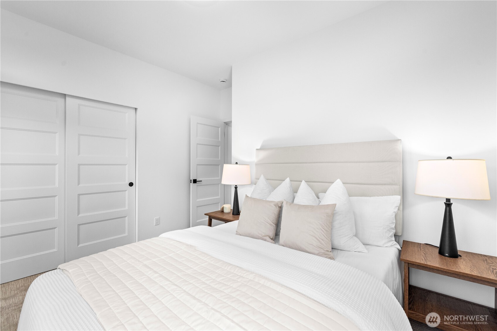 1704 North 47th Street Seattle, WA 98103 - Photo 28 of 38 a bedroom with a bed and a night stand