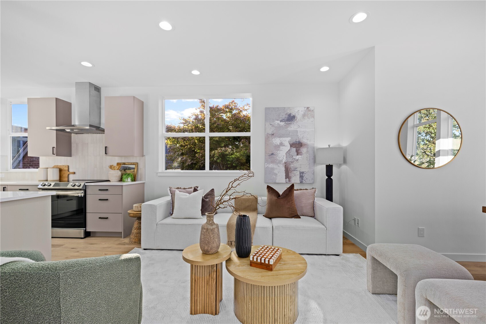 1704 North 47th Street Seattle, WA 98103 - Photo 7 of 38 a living room with furniture a window and a clock