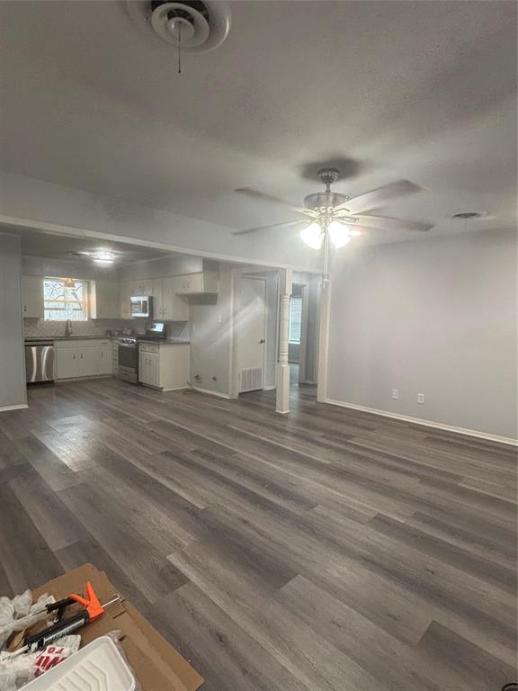 116 South 10th Street Sanger, TX 76266 - Photo 3 of 7 a view of a room with gym equipment and a window