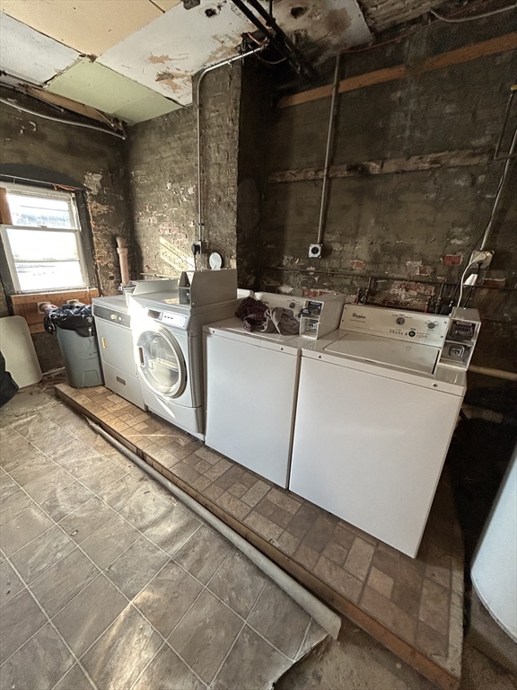 279 Webster Street, Unit 2 Boston, MA 02128 - Photo 19 of 20 a utility room with dryer and washer