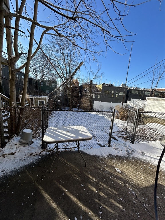 279 Webster Street, Unit 2 Boston, MA 02128 - Photo 20 of 20 a view of a backyard with sitting area