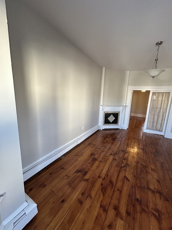 279 Webster Street, Unit 2 Boston, MA 02128 - Photo 3 of 20 a view of wooden floor in a room
