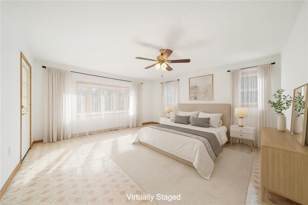 119 Story Road Export, PA 15632 - Photo 17 of 38 a spacious bedroom with a bed and a window