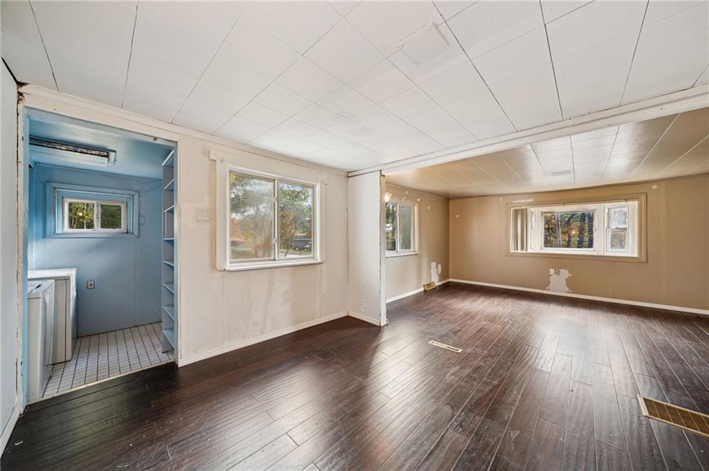119 Story Road Export, PA 15632 - Photo 21 of 38 a view of a big room with wooden floor and windows