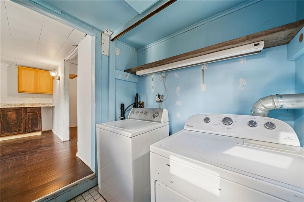 119 Story Road Export, PA 15632 - Photo 22 of 38 a utility room with dryer and washer