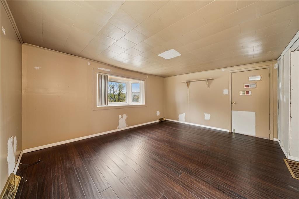 119 Story Road Export, PA 15632 - Photo 6 of 38 a view of an empty room with wooden floor and a window