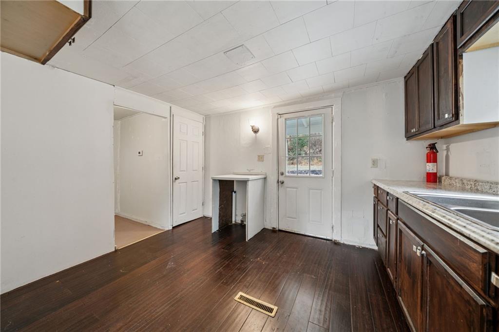 119 Story Road Export, PA 15632 - Photo 10 of 38 a view of a kitchen with wooden floor and electronic appliances