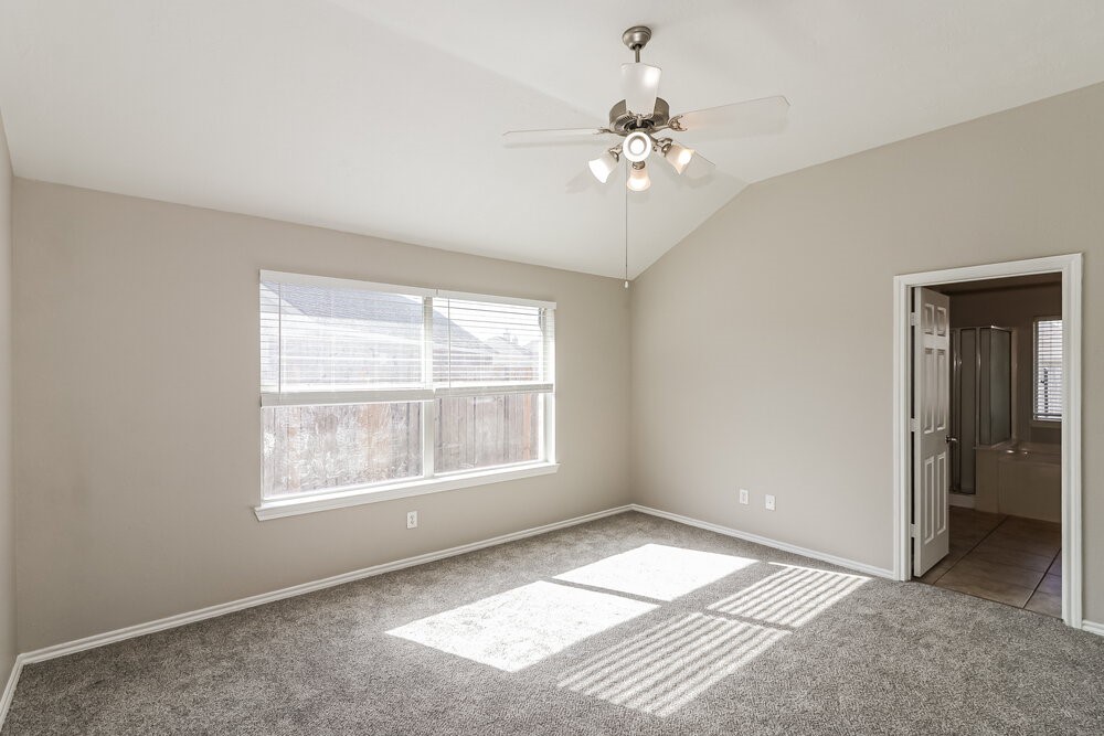 16419 Great Ridge Court Houston, TX 77083 - Photo 8 of 16 a view of an empty room with a window
