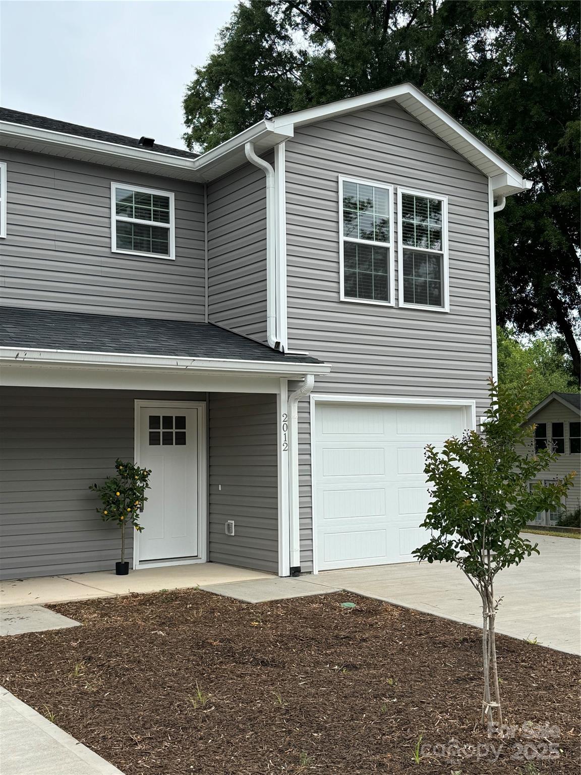 2012 Crown Point Drive Albemarle, NC 28001 - Photo 1 of 41 a front view of a house