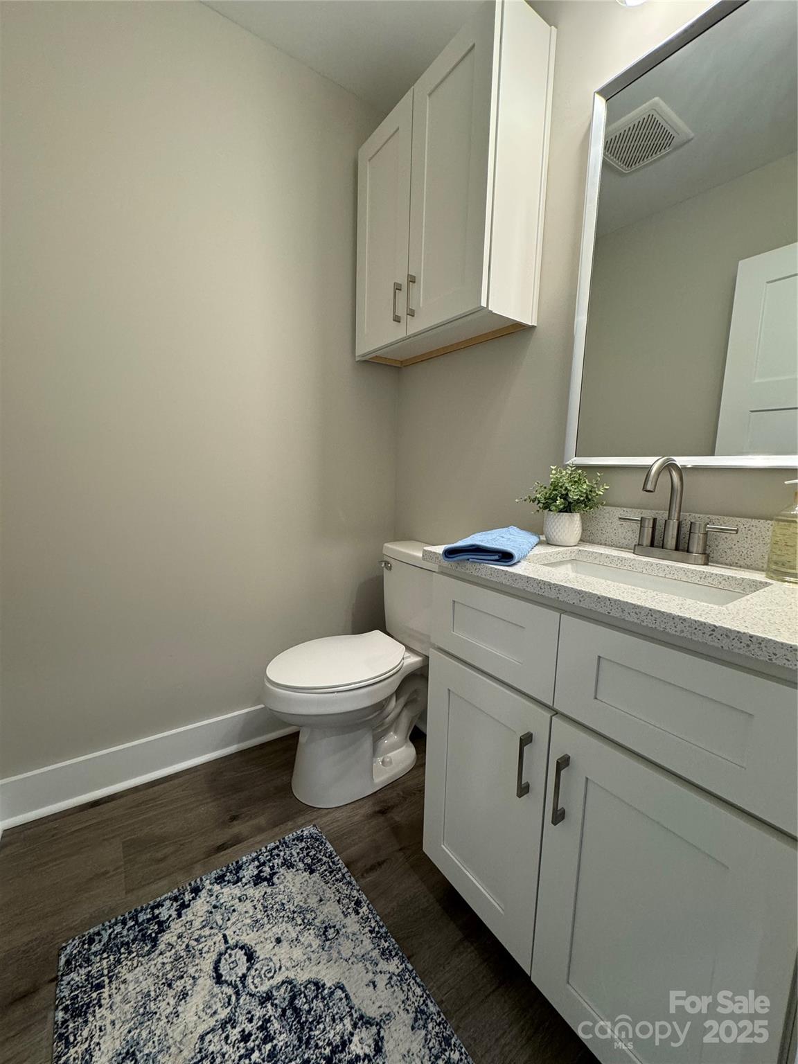 2012 Crown Point Drive Albemarle, NC 28001 - Photo 18 of 41 a bathroom with a toilet sink and mirror