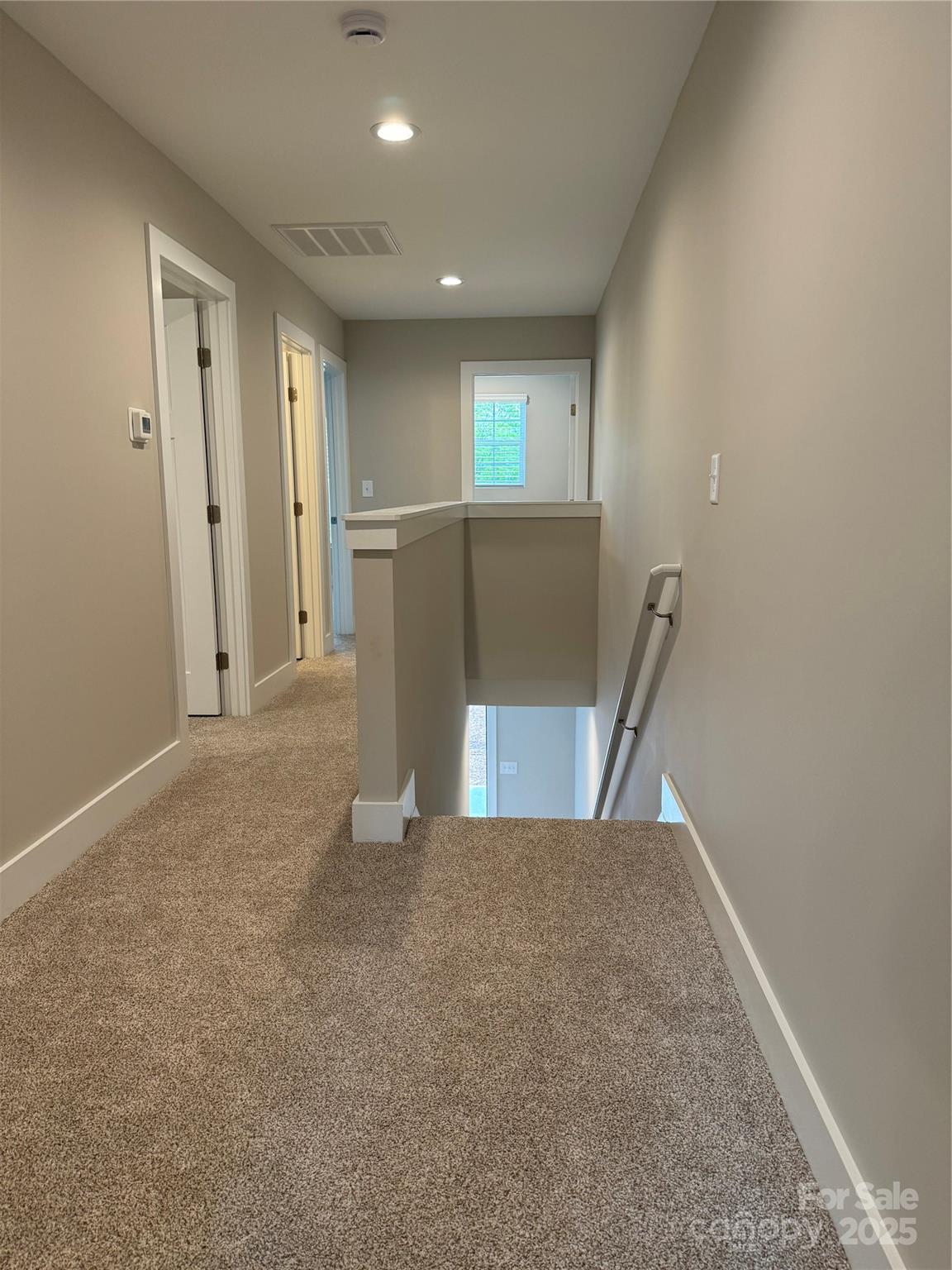 2012 Crown Point Drive Albemarle, NC 28001 - Photo 19 of 41 a view of a hallway with an empty room