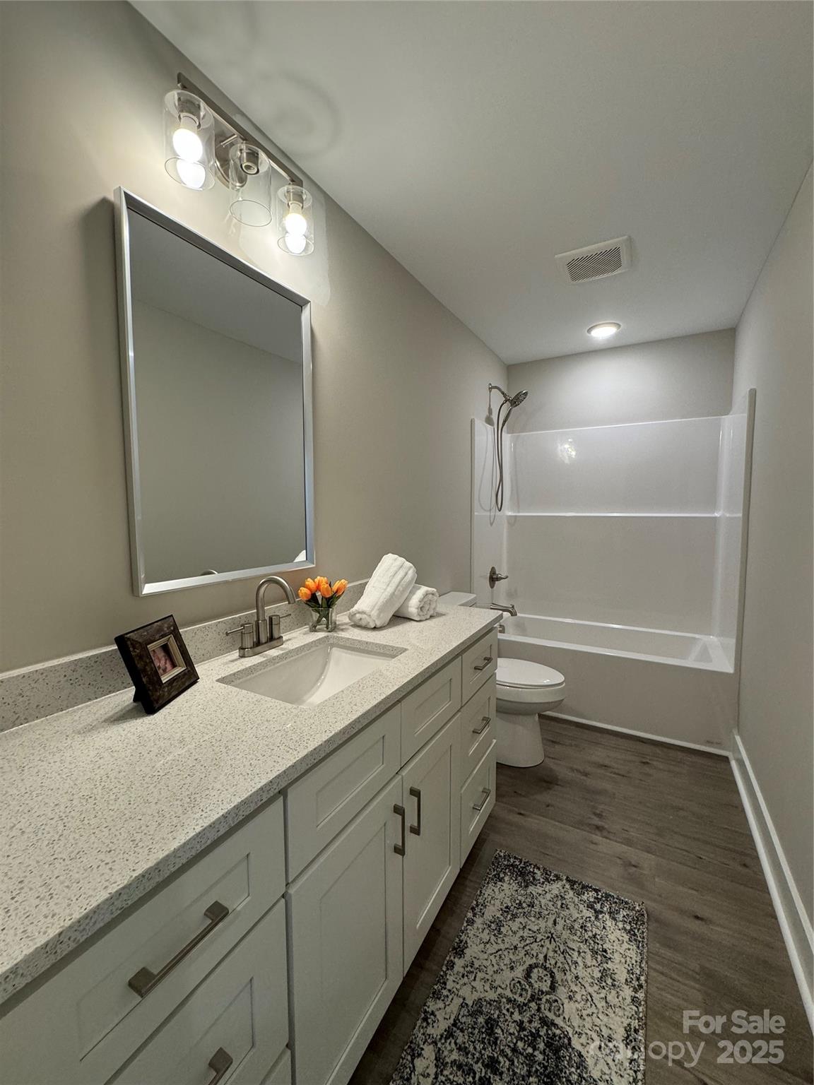 2012 Crown Point Drive Albemarle, NC 28001 - Photo 32 of 41 a bathroom with a double vanity sink toilet and a mirror