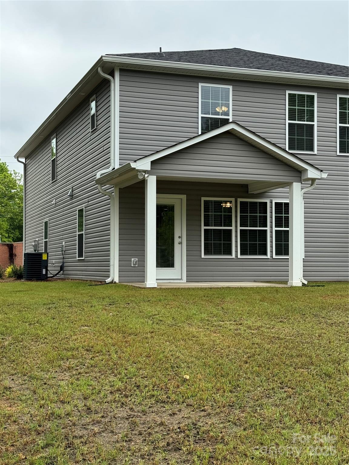 2012 Crown Point Drive Albemarle, NC 28001 - Photo 41 of 41 a front view of a house with a garden