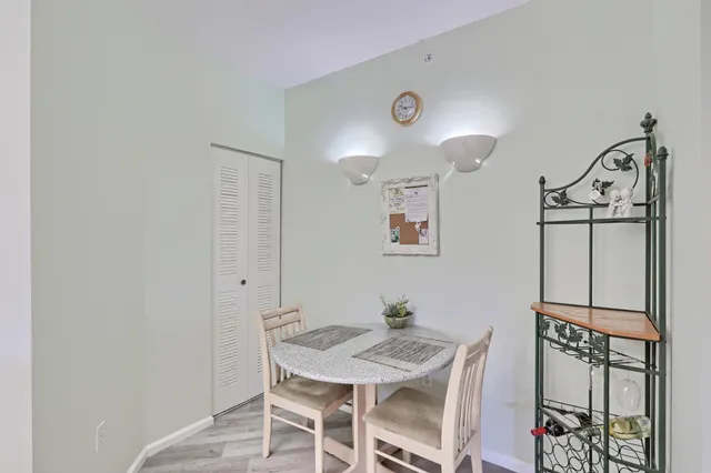 a view of a dining room with furniture