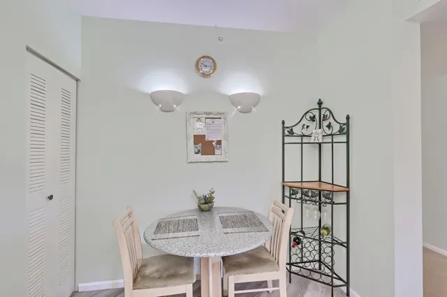 a view of a dining room with furniture window and outside view