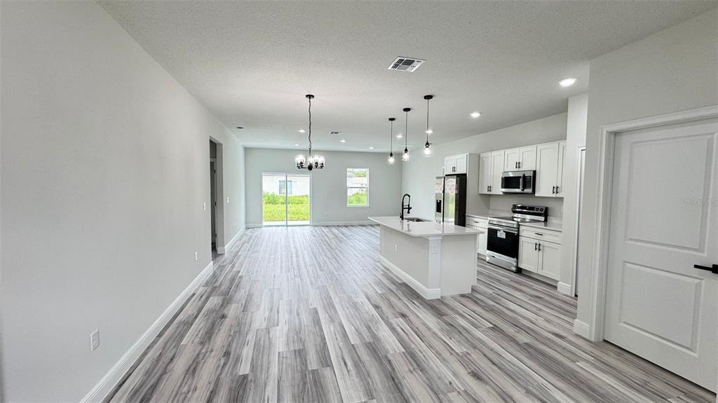 16884 Southwest 39th Circle Ocala, FL 34472 - Photo 12 of 29 a view of kitchen with cabinets and stainless steel appliances