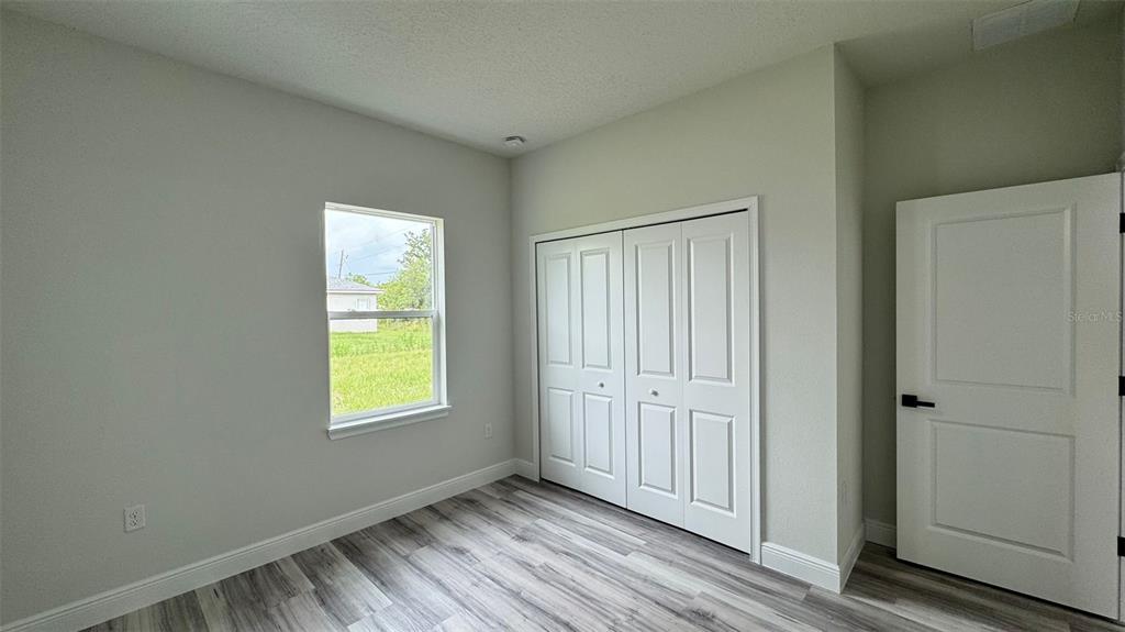 16884 Southwest 39th Circle Ocala, FL 34472 - Photo 16 of 29 an empty room with windows