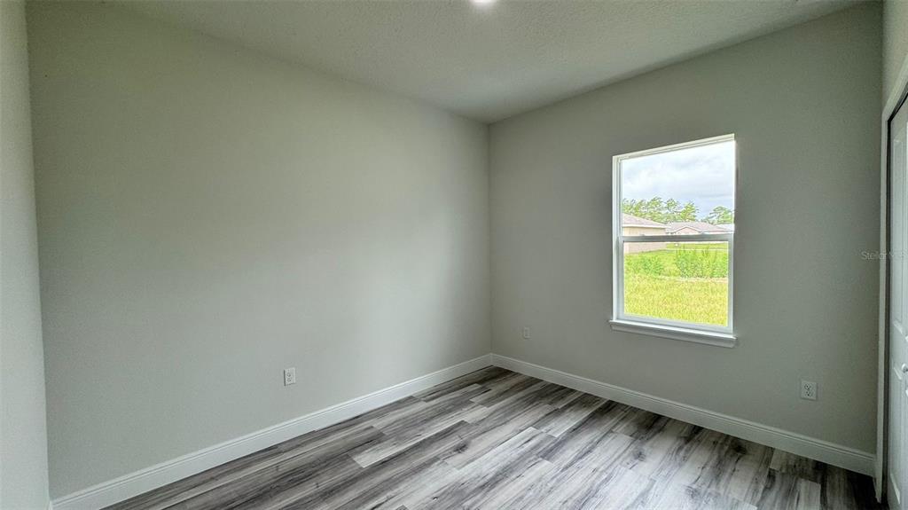 16884 Southwest 39th Circle Ocala, FL 34472 - Photo 17 of 29 a view of an empty room and window