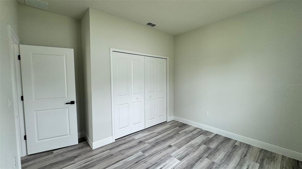 16884 Southwest 39th Circle Ocala, FL 34472 - Photo 19 of 29 a view of a room with wooden floor