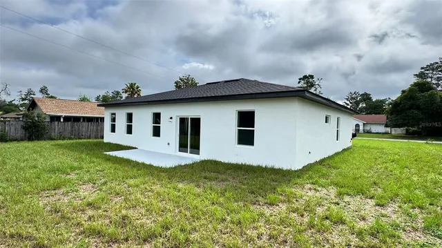 a house view with a garden space