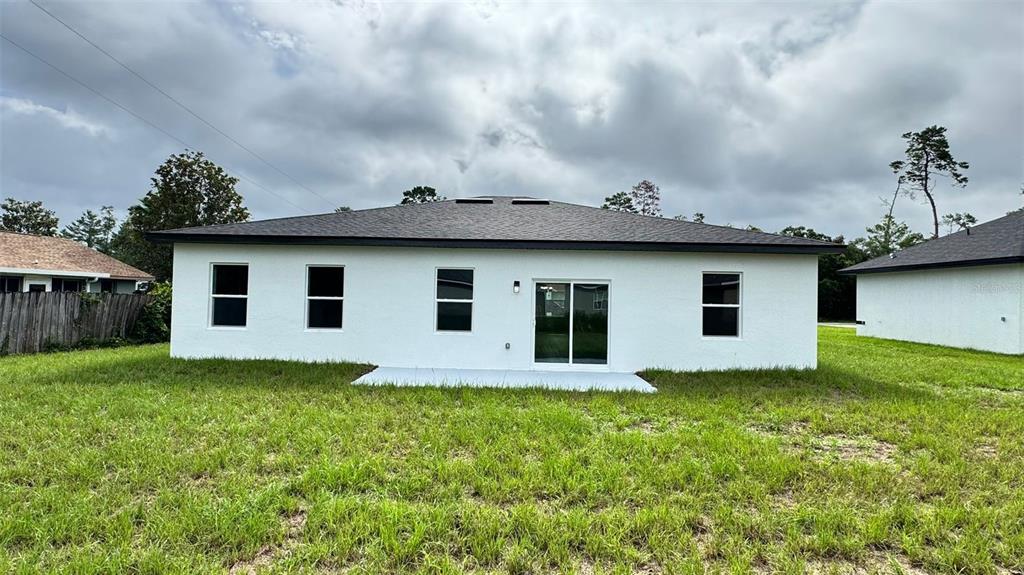 16884 Southwest 39th Circle Ocala, FL 34472 - Photo 3 of 29 a house with yard in front of it