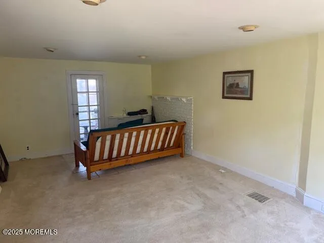 a bed room with a bed and a window