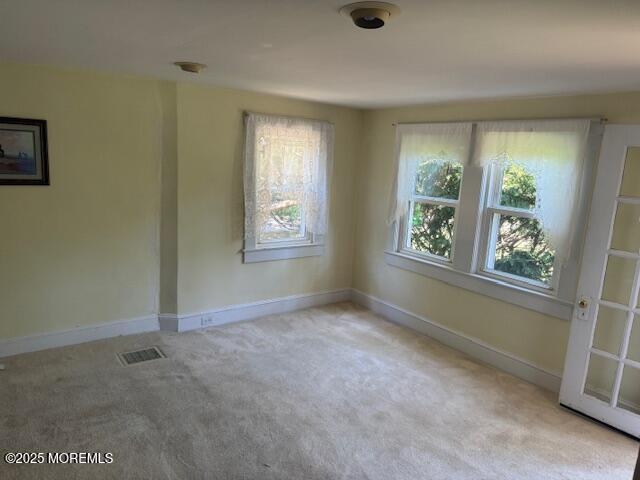 548 Hill Road Toms River, NJ 08753 - Photo 14 of 16 an empty room with windows