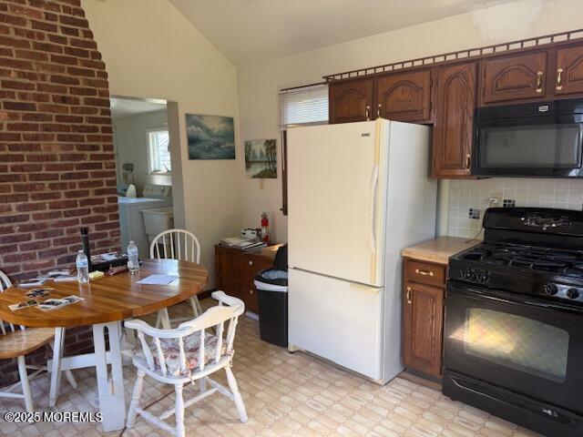 548 Hill Road Toms River, NJ 08753 - Photo 8 of 16 a kitchen with a refrigerator a stove a microwave and dining table