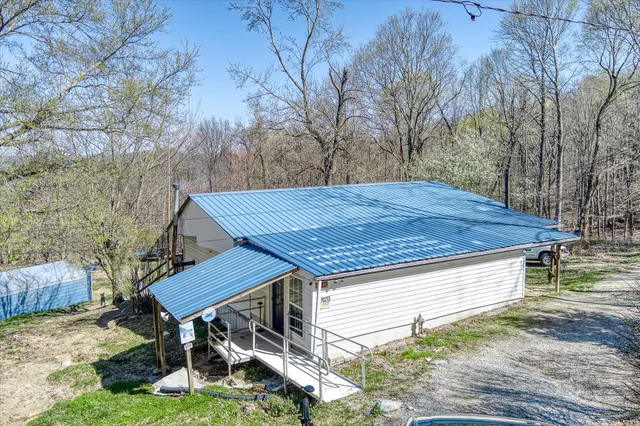 a wooden deck with a backyard