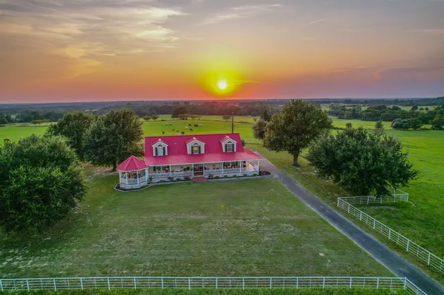 a view of a lake with a swimming pool and valleys in the background