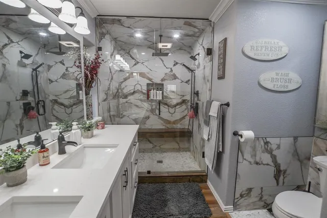 a bedroom with bed and a window