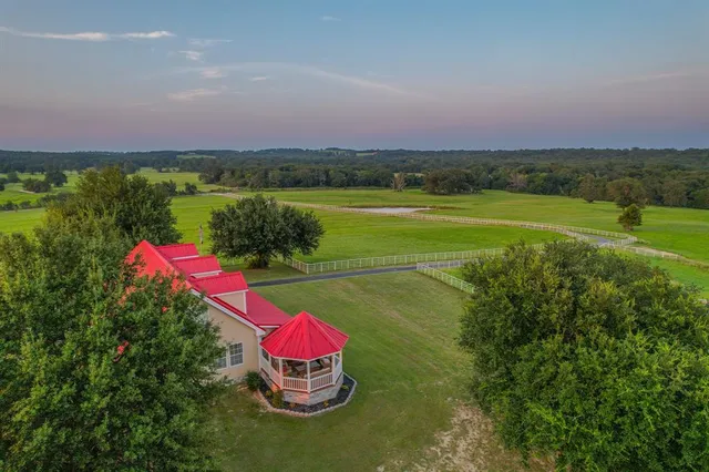 a view of a lake with a big yard